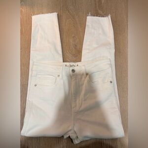 We The Free white raw hem skinny jeans